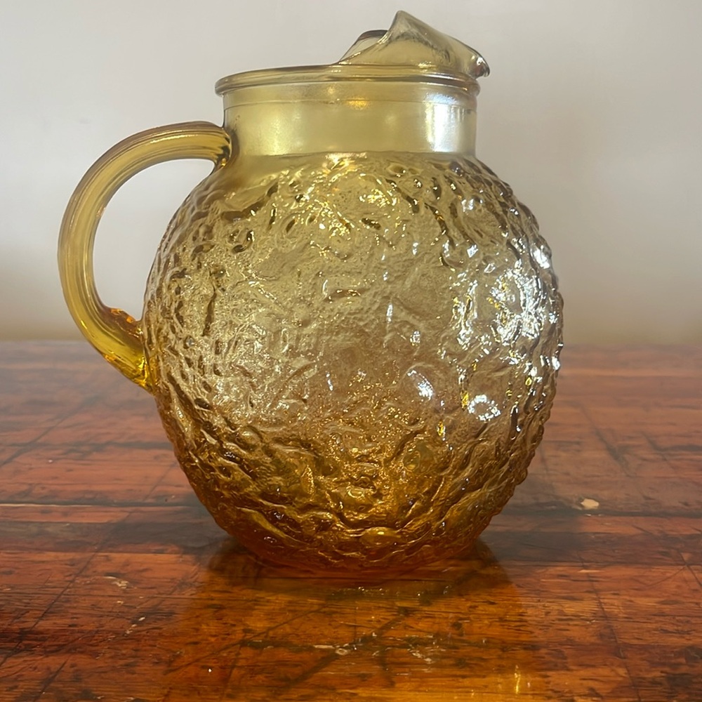Mid century golden honey glass round pitcher